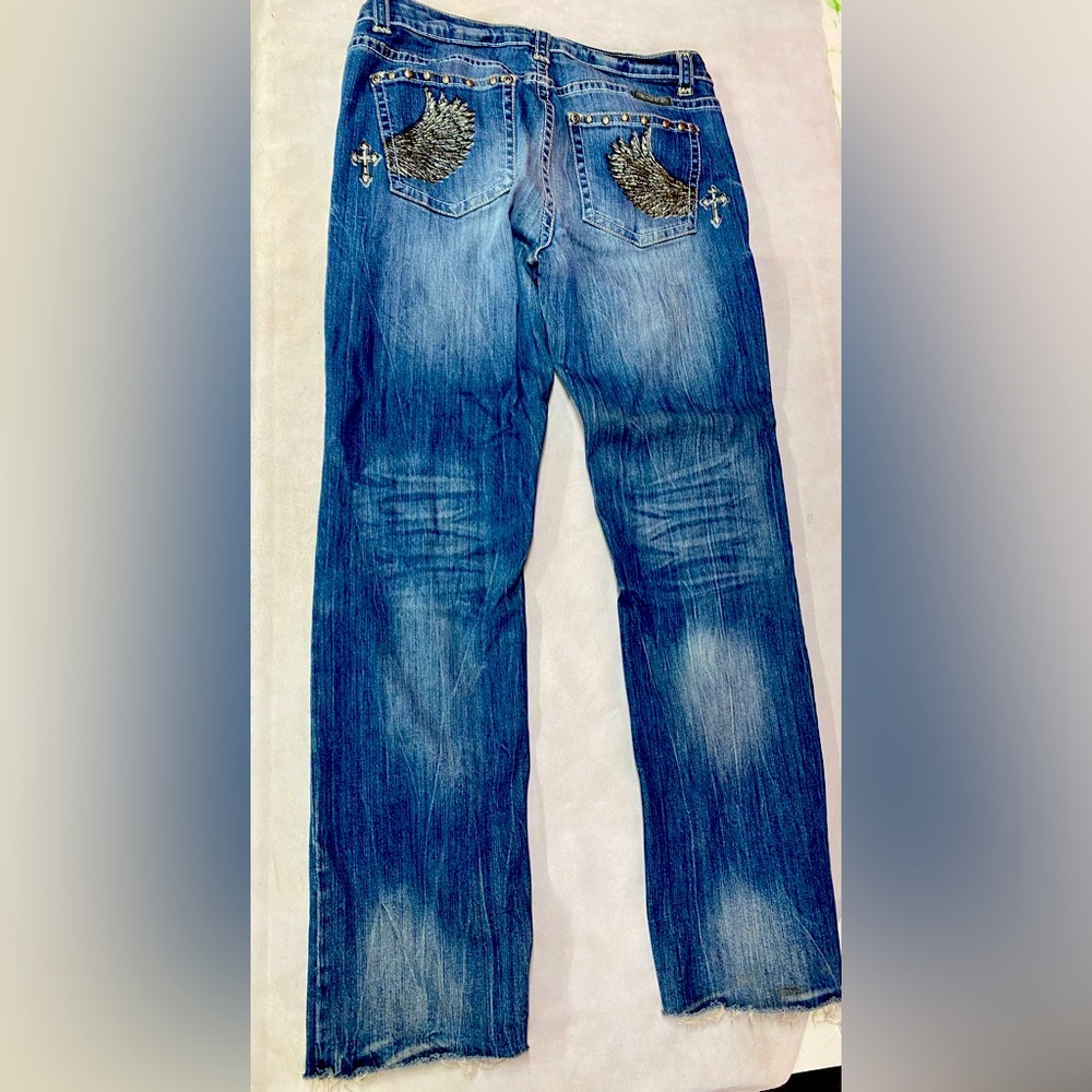 Cowgirl Tuff Jeans size 34 “Wing & a Prayer”